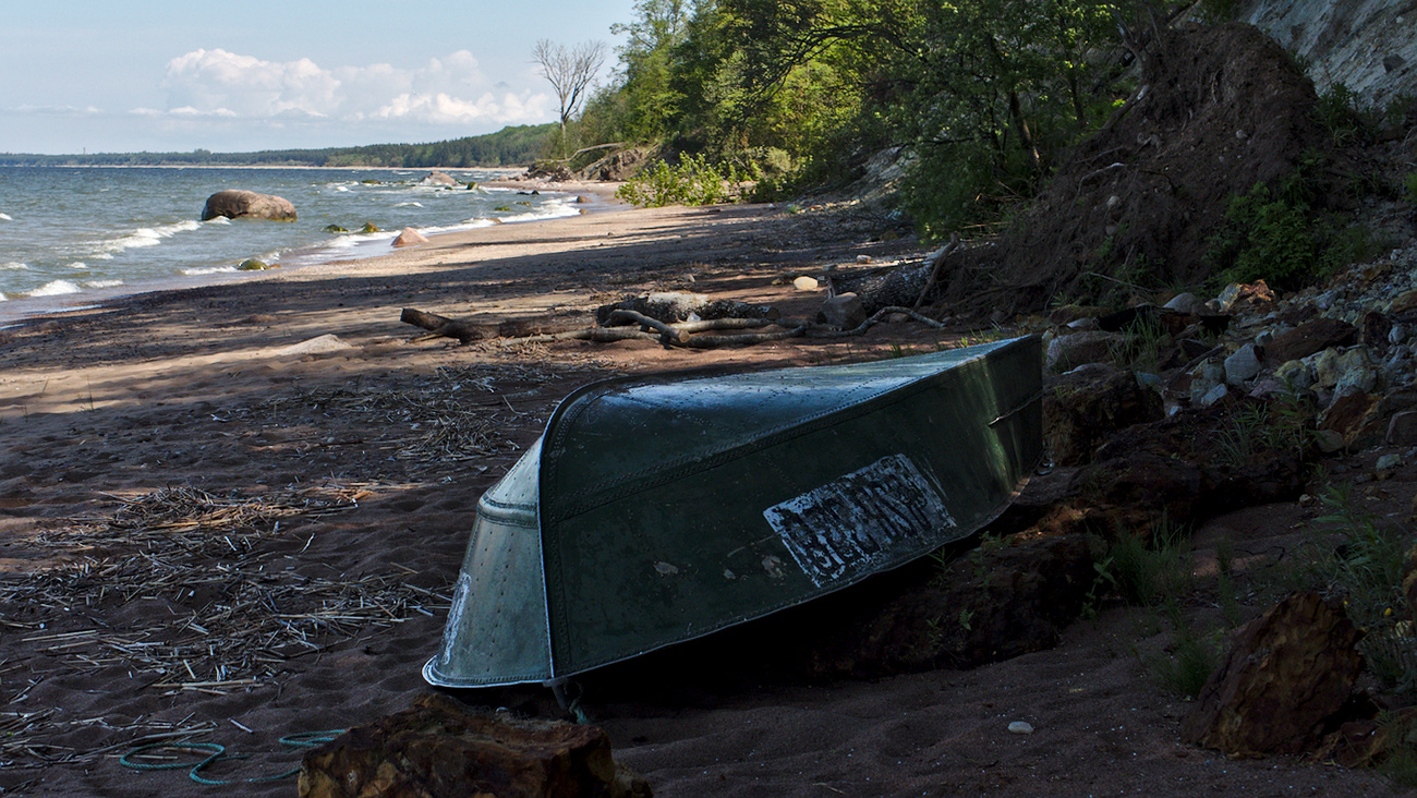Rowing boat at the shore of the Gulf of Finland, Estonia.