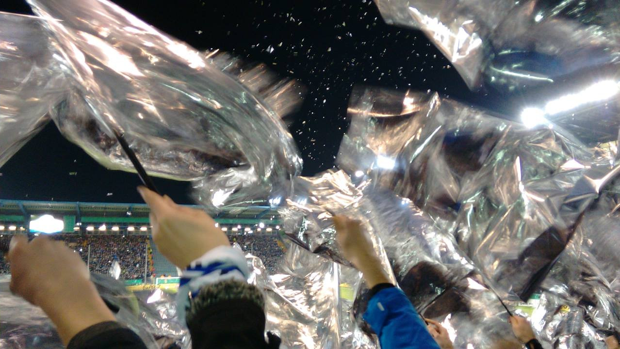 Arminia Bielefeld fans supporting their team with a choreography in a DFB-Cup best-of-sixteen match against Werder Bremen (3-1).