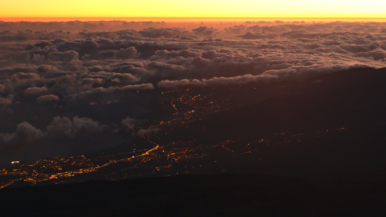 City lights at sunrise, viewed from Mount Teide, 3718 MAMSL, Tenerife.
